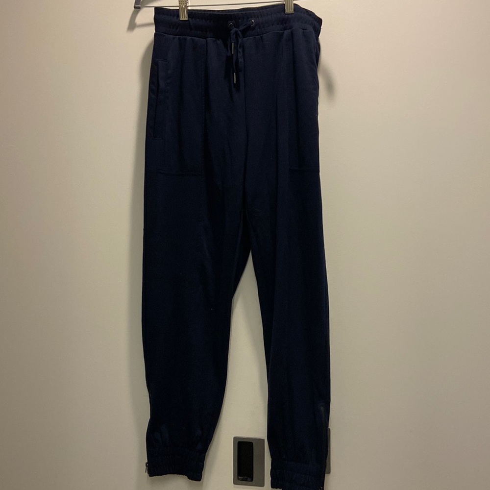 Banana Republic navy joggers with zip bottoms and elastic tie waist